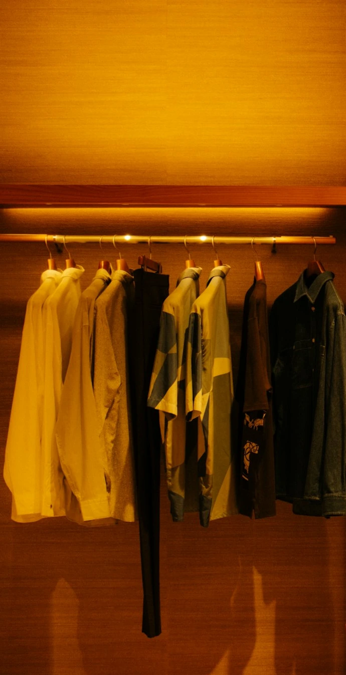 Clothing displayed in a well-lit boutique store.